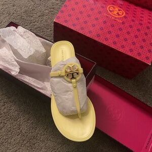 Yellow Tory Burch slides